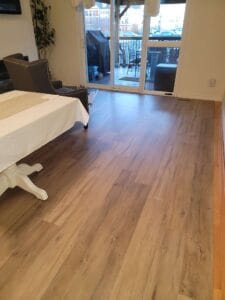 "Dark walnut hardwood flooring transforming Toronto condo living space"