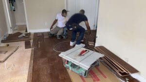 "Warm-toned hardwood floor complementing minimalist Toronto interior"